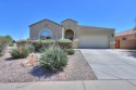 Step into this charming single-story residence, boasting 4 for sale in Maricopa Arizona Pinal County County on GolfHomes.com