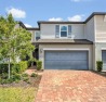 Welcome to your dream townhouse! This modern, practically new for sale in Ocoee Florida Orange County County on GolfHomes.com