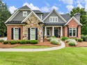 Discover timeless elegance and exceptional craftsmanship in this for sale in Braselton Georgia Gwinnett County County on GolfHomes.com