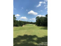 This premium golf course property is located at the #11 Tee of for sale in Badin Lake North Carolina Montgomery County County on GolfHomes.com
