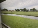 Afternoon setting sun from your huge wide enclosed patio for sale in Delray Beach Florida Palm Beach County County on GolfHomes.com
