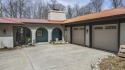 This unique 3900 sq foot resort- like residence is located on a for sale in Bellaire Michigan Antrim County County on GolfHomes.com