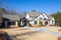 Nestled in prestigious River Club, one of Atlanta's most for sale in Suwanee Georgia Gwinnett County County on GolfHomes.com