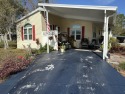 Located in beautiful Rolling Greens Village, this spacious 2 for sale in Ocala Florida Marion County County on GolfHomes.com