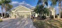 Welcome to this stunning LANTANA with HEATED POOL home, SPA for sale in The Villages Florida Marion County County on GolfHomes.com