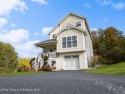 Serene Country Club Living in the Poconos** Welcome to your for sale in East Stroudsburg Pennsylvania Monroe County County on GolfHomes.com