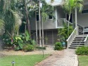 As you pull up to 5 South Marina Dr. you will notice the for sale in Key Largo Florida Monroe County County on GolfHomes.com