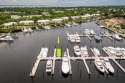 Main Marina Dock to accommodate your 70' yacht.   The beam is for sale in Key Largo Florida Monroe County County on GolfHomes.com